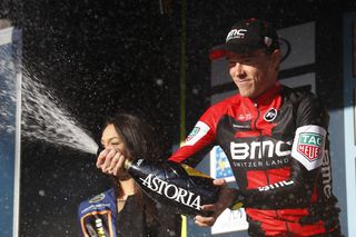 Rohan Dennis celebrates after winning the time trial at Tirreno-Adriatico