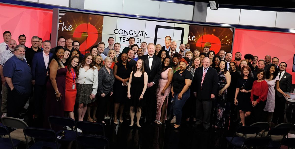 Larry Audas and his WFMY colleagues