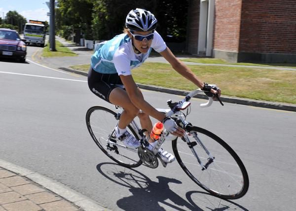 Catherine Cheatley grits her teeth with just one lap remaining.
