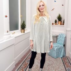 tv presenter fearne cotton in white room and potted plants