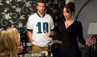 Silver Linings Playbook Jennifer Lawrence makes a scene at dinner while Bradley Cooper watches