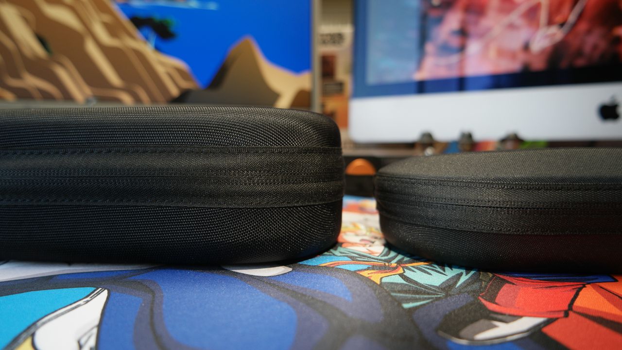 Sennheiser Momentum 5 headphones case on the right, and HDB 630 on the left