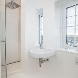 bathroom with white wall and shower