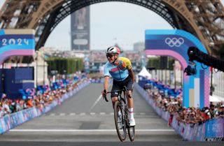 PARIS FRANCE AUGUST 03 Remco Evenepoel of Team Belgium clebrates at finish line as Gold medal winner during the Mens Road Race on day eight of the Olympic Games Paris 2024 at trocadero on August 03 2024 in Paris France Photo by Jared C TiltonGetty Images