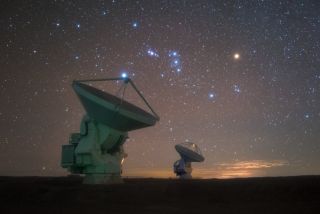 The constellation of Orion, the hunter sparkles above the Atacama Large Millimeter/submillimeter Array (ALMA) in Chile's Atacama Desert in this image by European Southern Observatory photo ambassador Yuri Beletsky. Two of the 66 radio telescopes that make up the array are shown in this view. Located on top of the 16,000-foot (5,000 meters) Chajnantor plateau, ALMA's location provides the dark, dry skies that are crucial for observing the cosmos in millimeter and submillimeter wavelengths.