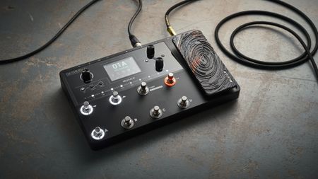 A Mooer GE150 Max Li multi-effects pedal on a concrete floor