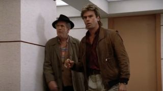 John Anderson and Richard Dean Anderson walking past a corner on MacGyver