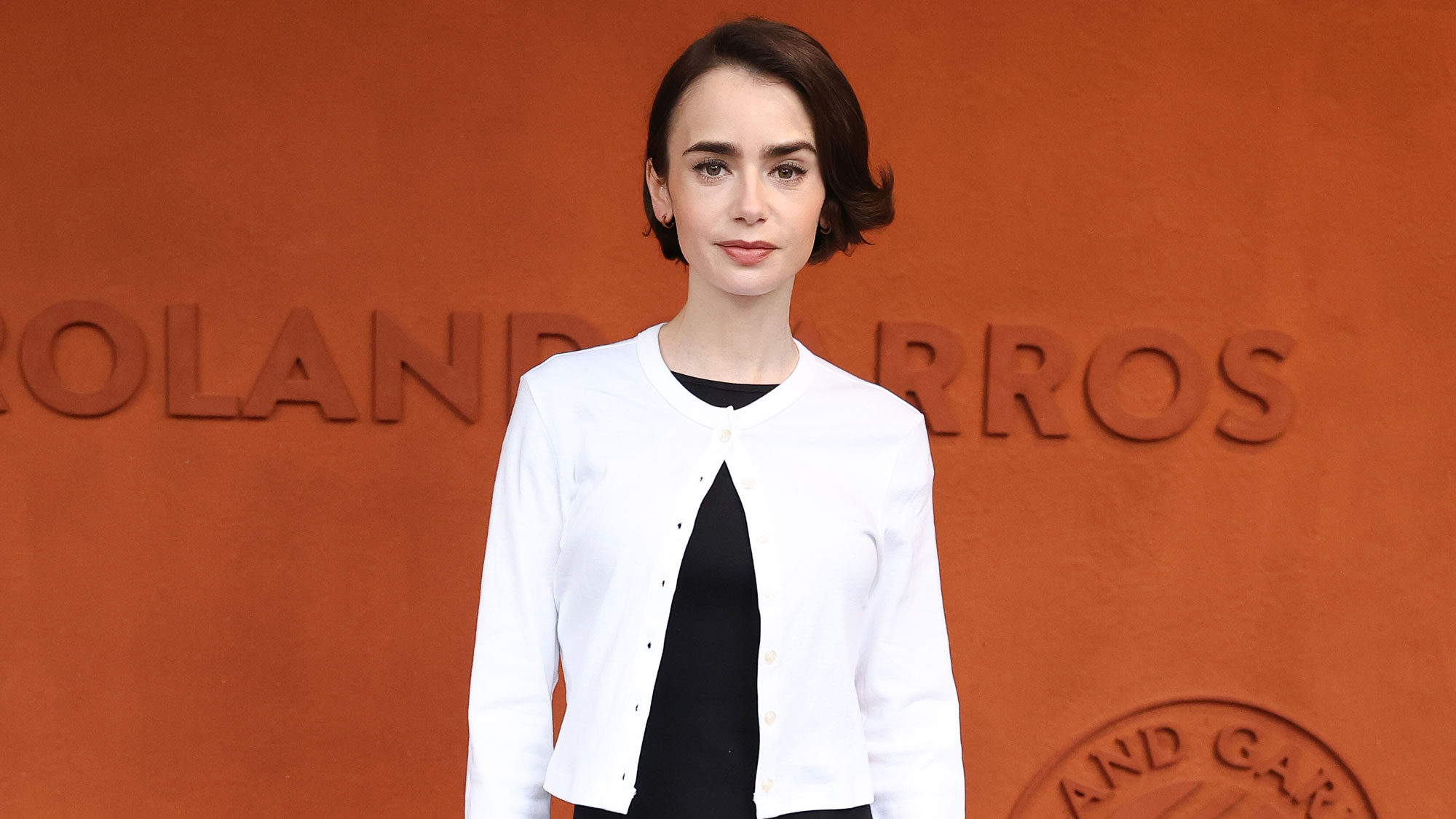 Lily Collins wears jazz shoes in Paris at the French Open