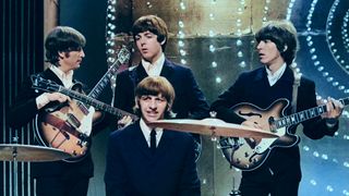 The Beatles rehearse for their performance on the BBC-TV's 'Top Of The Pops' at BBC Television Centre in London, June 1966., Standing behind drummer Ringo Starr are left to right: John Lennon, Paul McCartney and George Harrison.