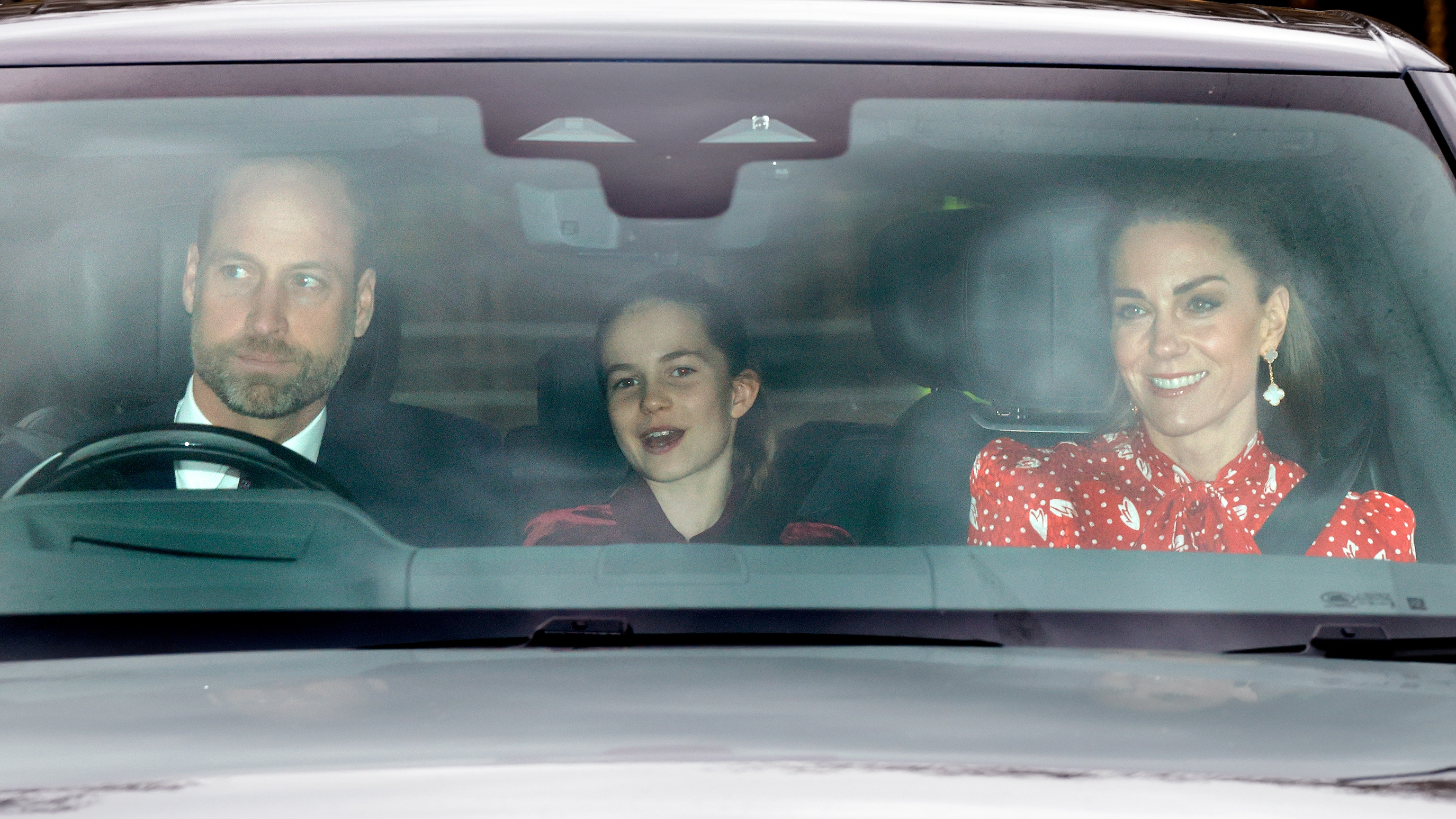 Prince William, Princess Charlotte of Wales and Catherine, Princess of Wales are seen as they drive to attend a Christmas Lunch