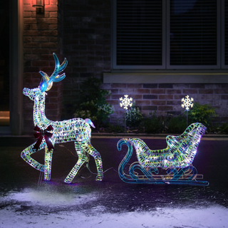 multicoloured light up reindeer outside a house