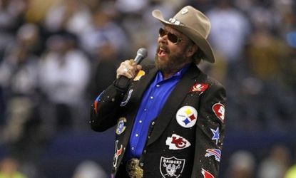 Hank Williams Jr. sings his signature NFL opener live: ESPN's firing of the country star has critics wondering if the punishment fit the crime.