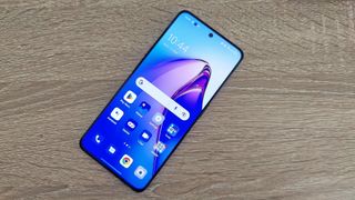 Oppo Reno 8 Pro review: phone on wooden desk with screen unlocked
