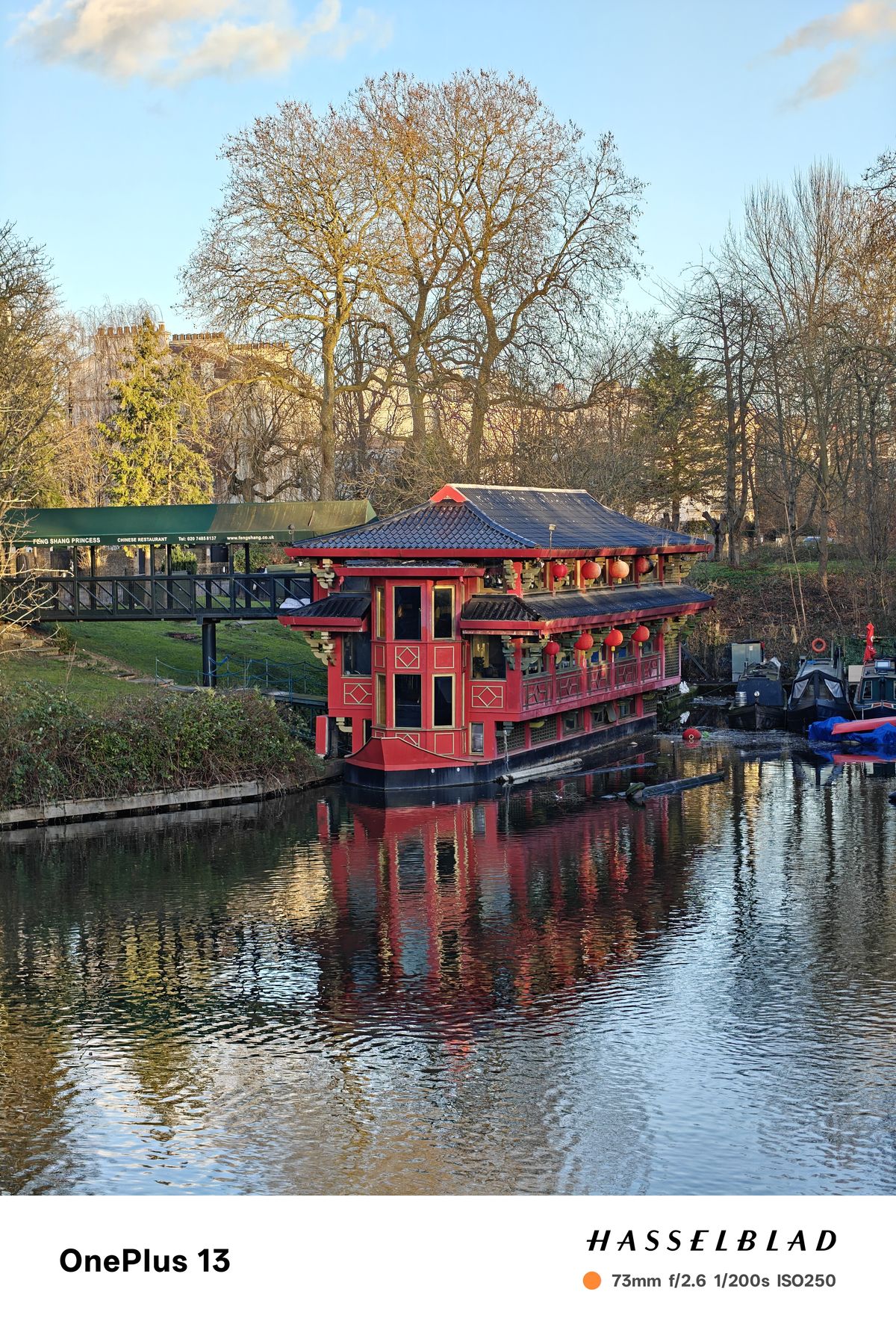 A Chinese style boat floating in a canal in London