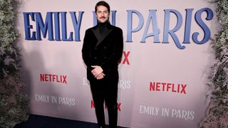 NEW YORK, NEW YORK - DECEMBER 15: Lucas Bravo attends the Emily In Paris French Consulate Red Carpet at French Consulate on December 15, 2022 in New York City.