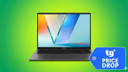 Asus Vivobook S16 shown with green background