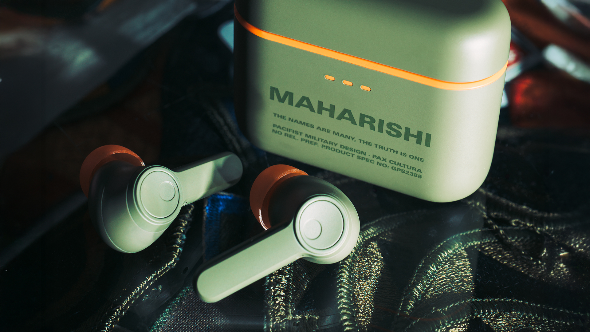 Cambridge Audio Maharishi Melomania A100 earbuds in lifestyle shot