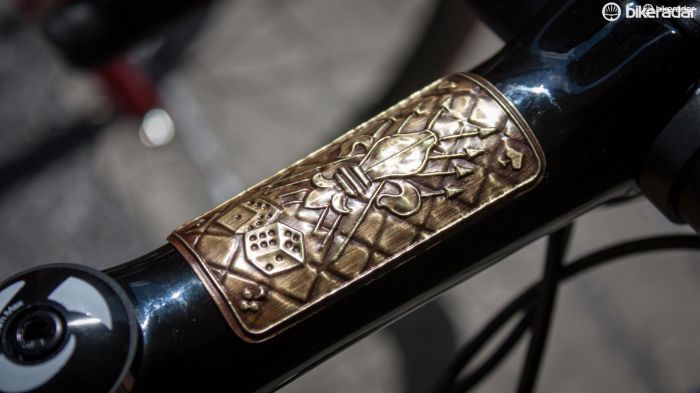The fleur-de-lys badge has been transplanted to the new Domane's black stem. Cancellara's roll of the dice certainly paid off on stage two