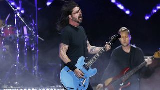 Dave Grohl playing his Gibson DG-335