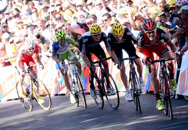 Cadel Evans surges into the final bend of stage 7 in the Tour de France