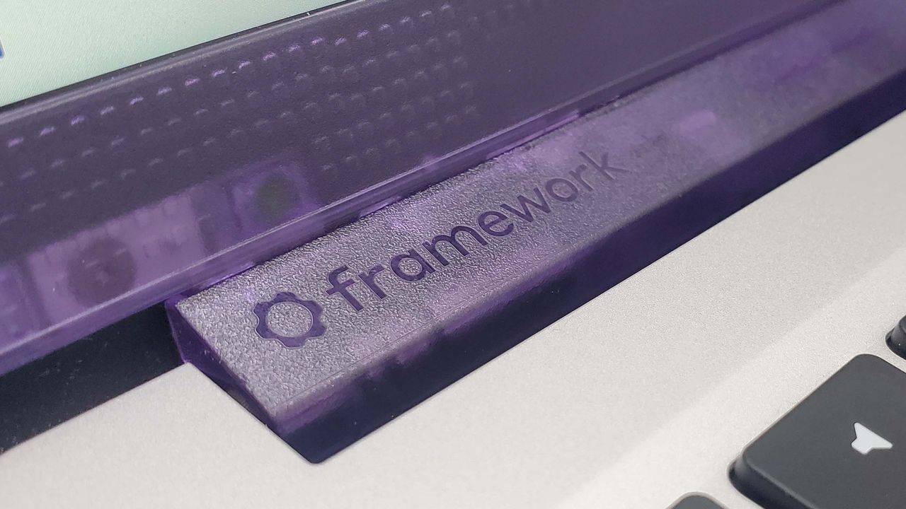 Framework 13 laptop on a dark grey background