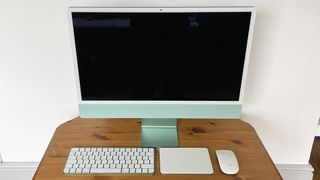 Apple iMac M1, one of the best computers for graphic design, on a desk