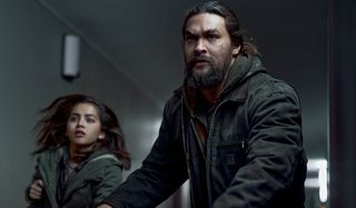 Isabela Merced and Jason Momoa on the run in Sweet Girl.