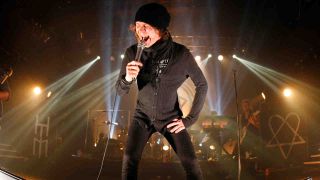 HIM’s Ville Valo performing onstage in 2013