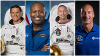 four people pose for a portrait in flight suits