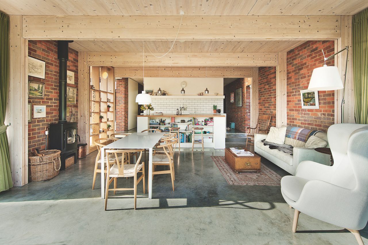 open plan kitchen with concrete floor and stove
