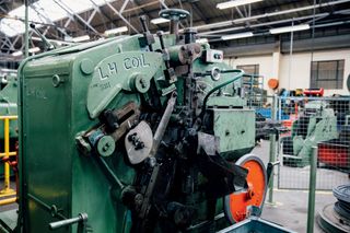 The machine that makes the left-hand springs can be temperamental. Photo: Chris Catchpole