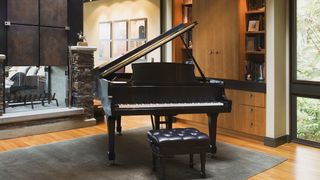 Black grand piano in a stylish living room