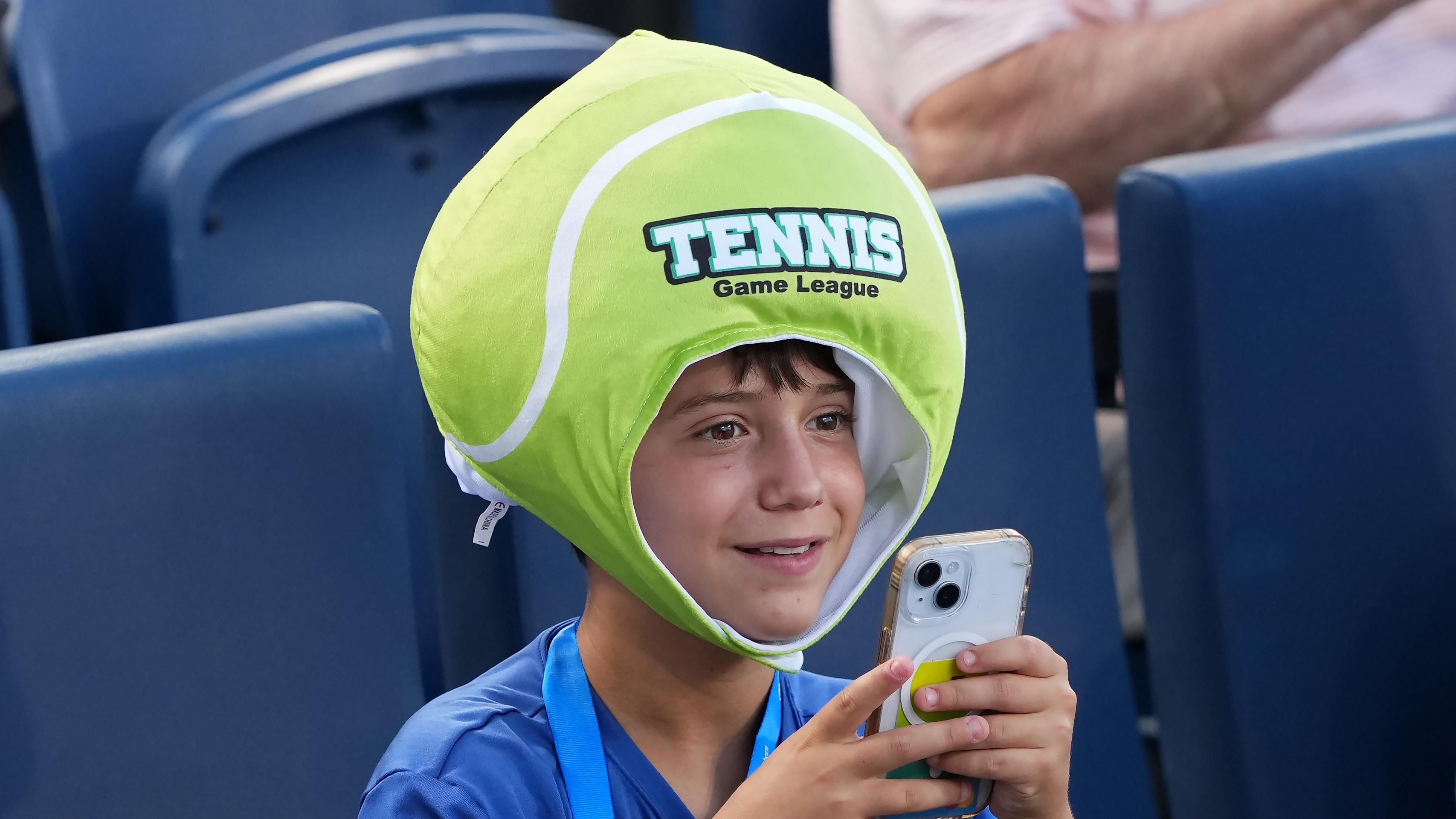 A fan takes pictures during the match between Ben Shelton of the United States and Camilo Ugo Carabelli of Argentina during Day 4 of the Cincinnati Open at the Lindner Family Tennis Center on August 10, 2025 in Mason, Ohio.