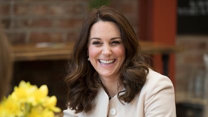 Kate Middleton laughs with Hold Still model over pizza story