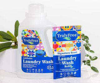 Truly Free laundry detergent in a bottle and pouch