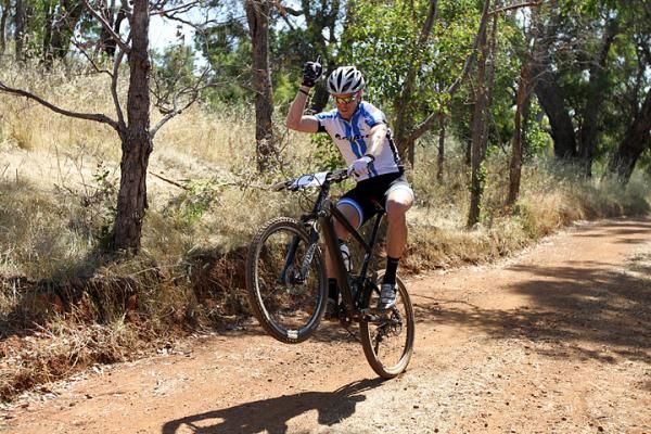 Josh Carlson crosses the line to win the final in the elite men's eliminator.
