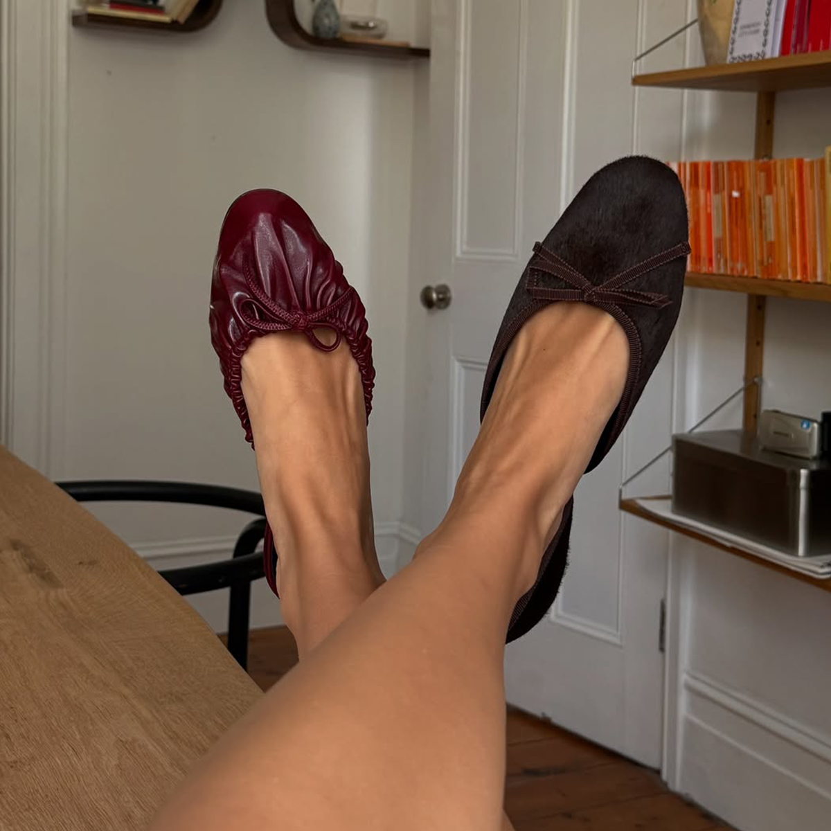 a photo of Lizzy Hadfield wearing a pair of Herbert Levine flats