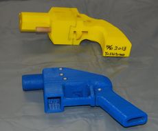 Two 3D-printed guns.