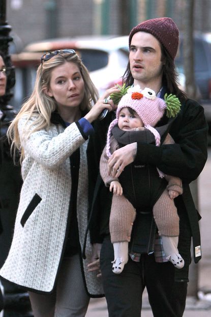 Sienna Miller, Tom Sturridge and baby Marlowe pictured in New York