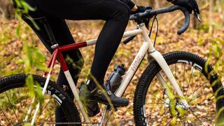 Gravel bike being ridden in the woods