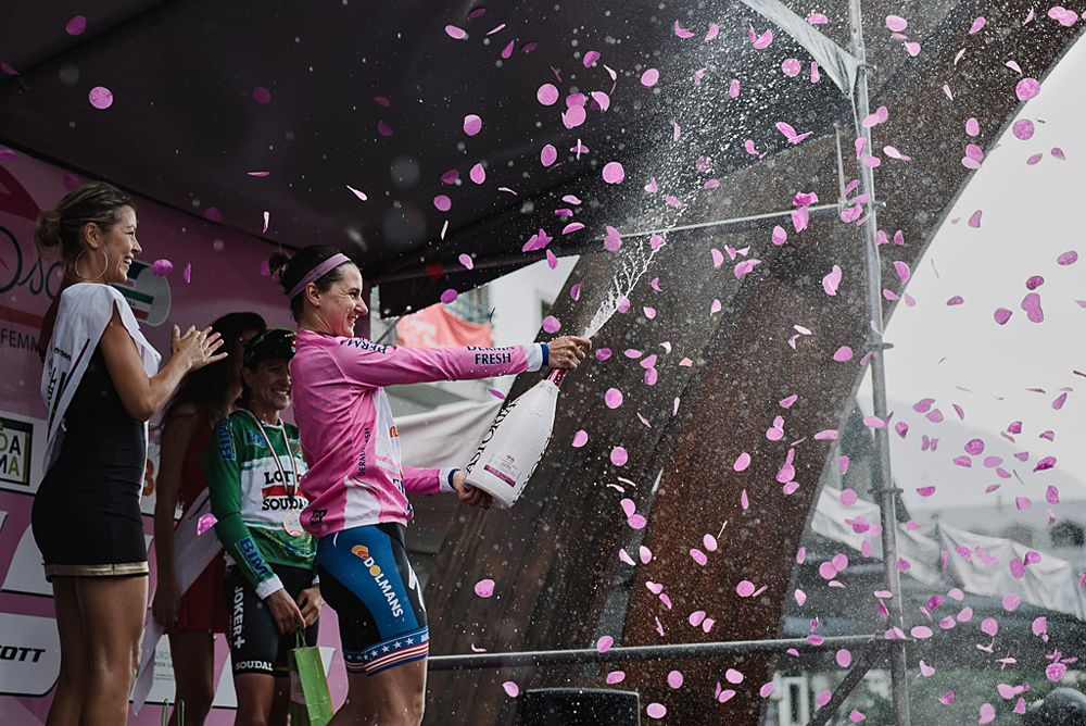 Megan Guarnier (Boels Dolmans) celebrates wearing the pink jersey after stage 5