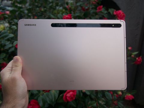 The Samsung Galaxy Tab S8+, held in one hand