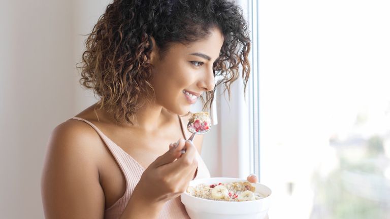 Woman eating a healthy breakfast