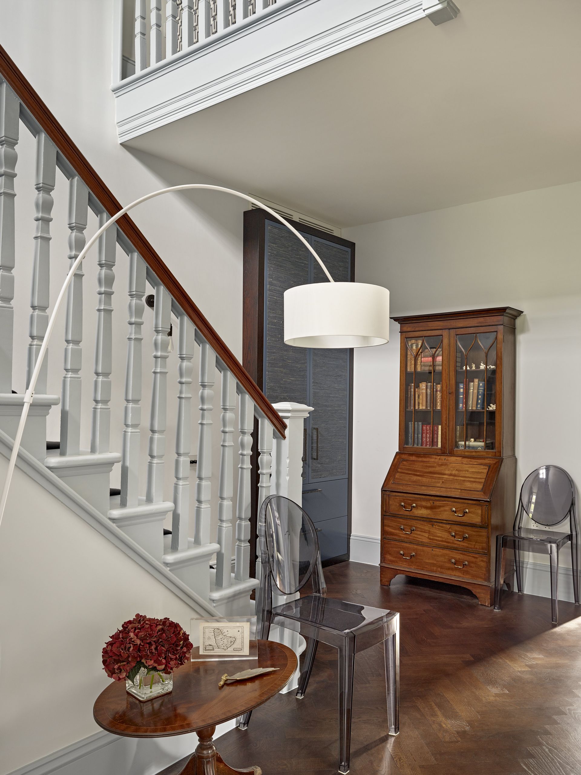 Hallway with arched floor lamp