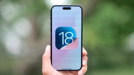 iOS 18 logo on an iPhone 15 Pro