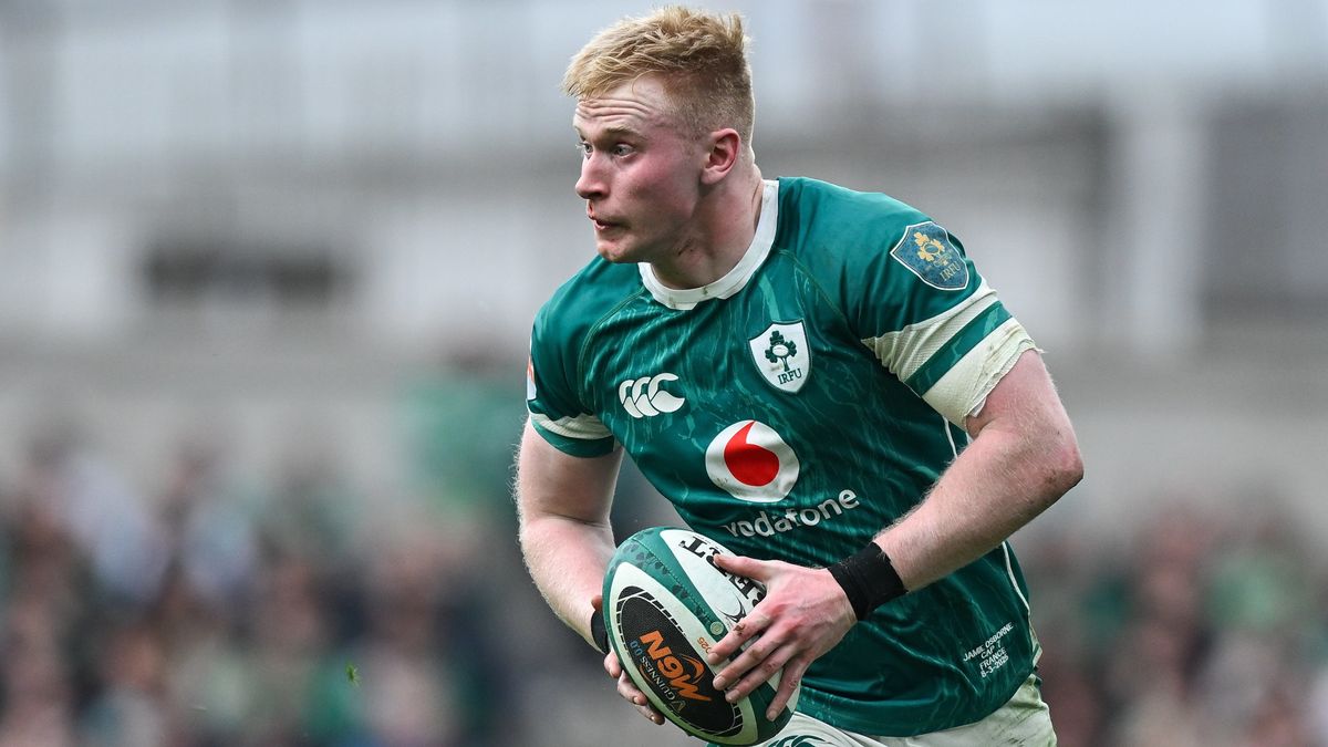 Jamie Osborne of Ireland during the Guinness Six Nations Rugby Championship 2025 with the ball in his hands.