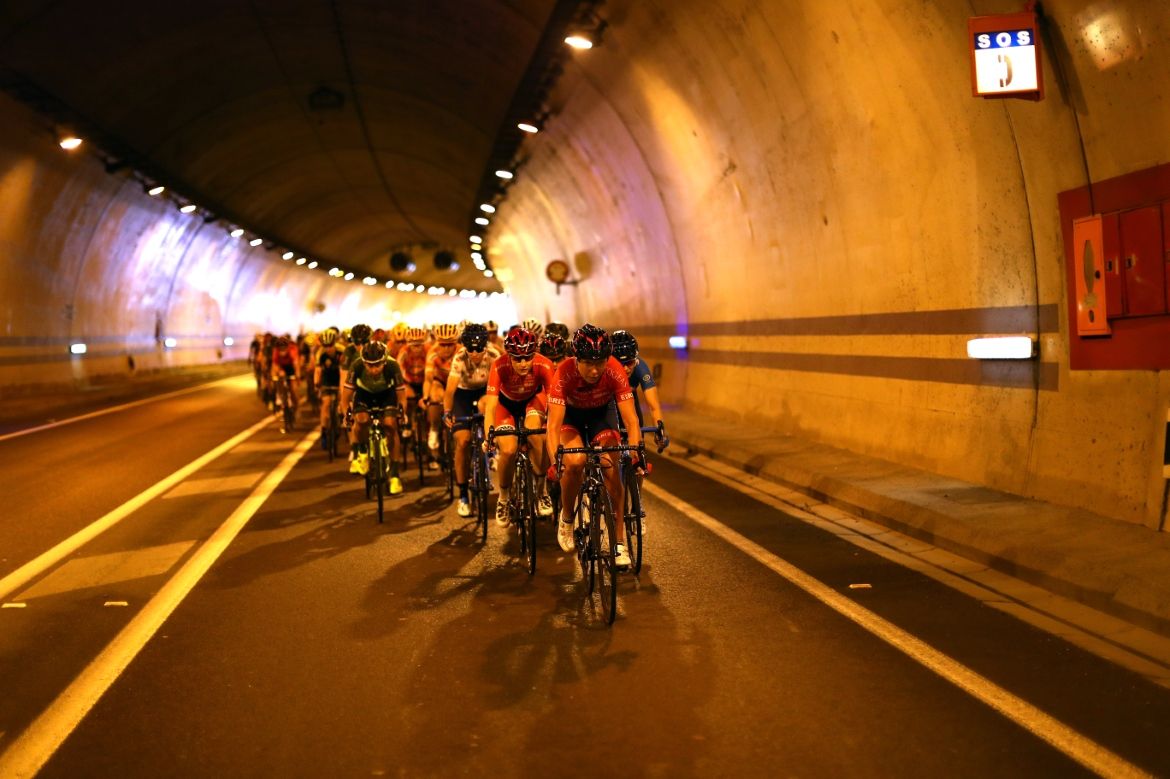Riders head through a tunnel on stage 3