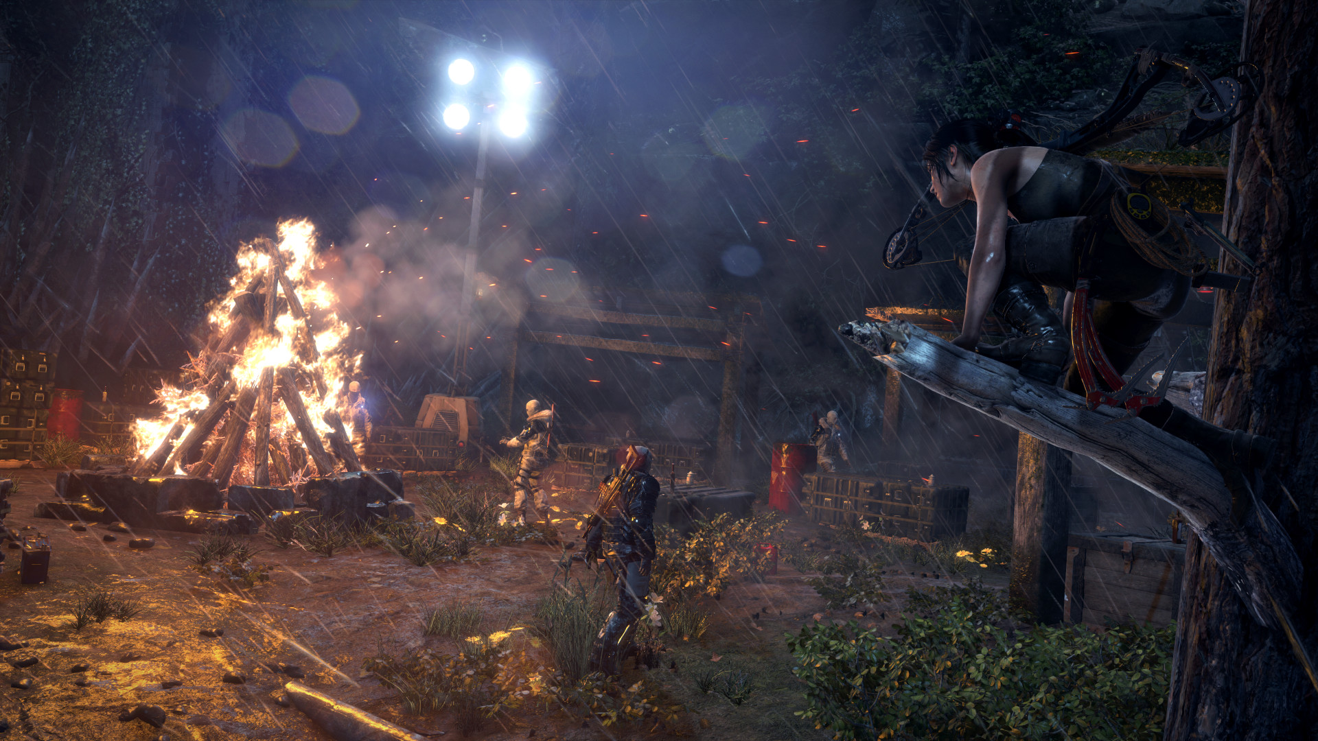 Promotional screenshot of Lara Croft stalking enemies in Rise of the Tomb Raider