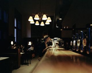 Dror For Tumi Austria - woman alone at a bar