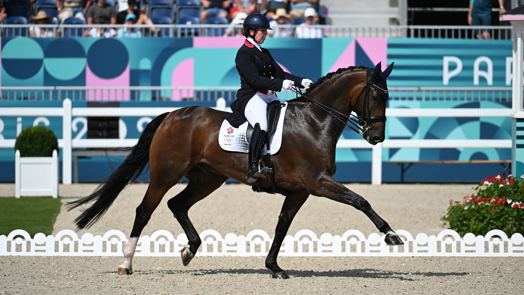 Becky Moody riding Jagerbomb in a dressage arena